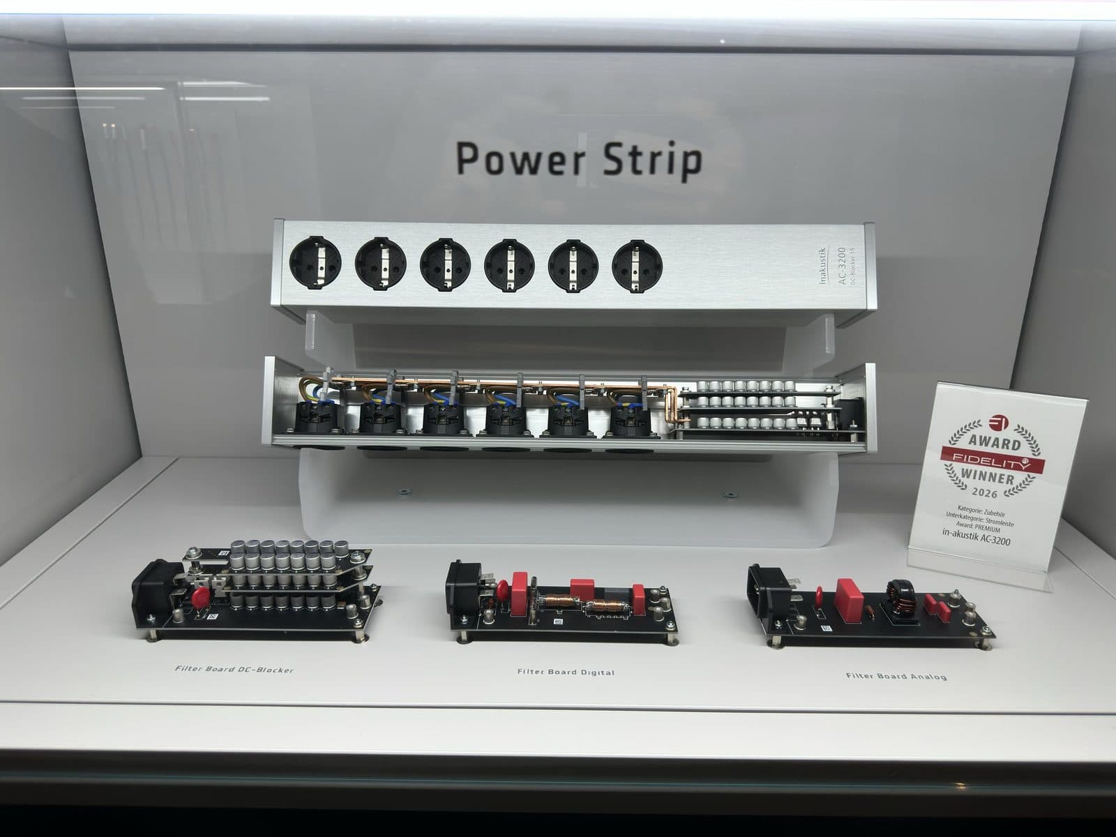in-akustik power strip opened up to show the internal filter boards